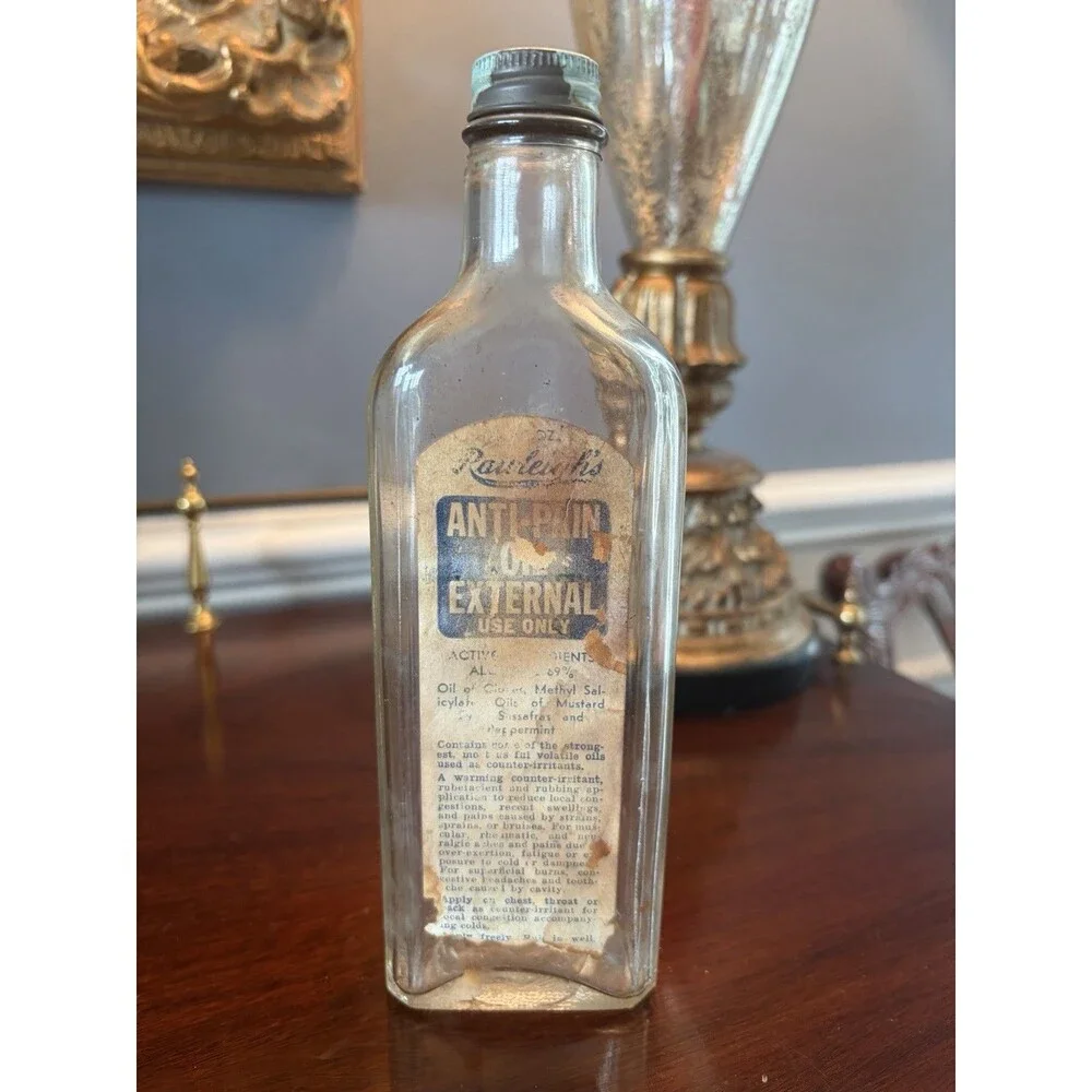 Vintage Rawleigh's  Medicine Anti-Pain Oil Bottle with Lid
